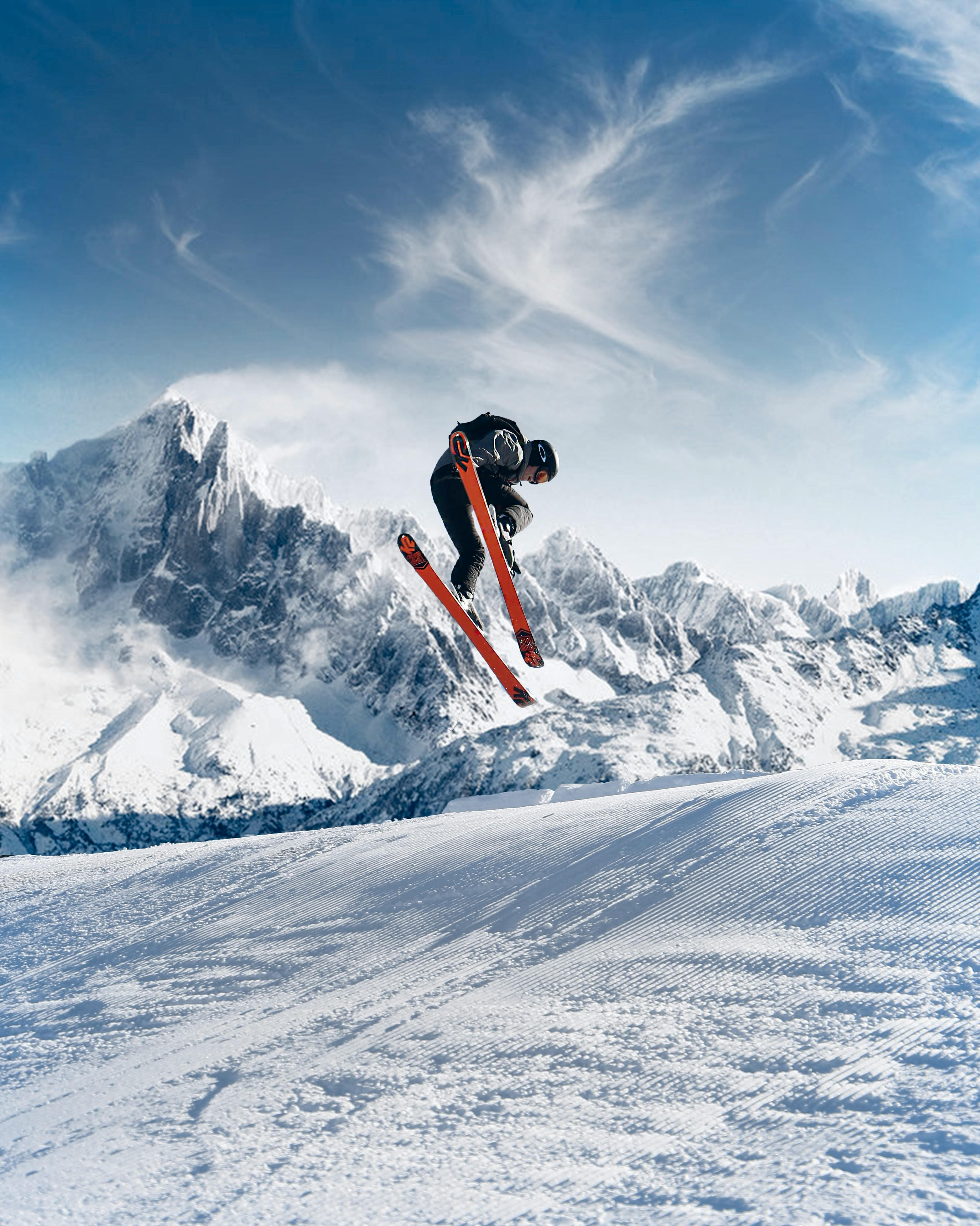 Skier jumping on snowy slope